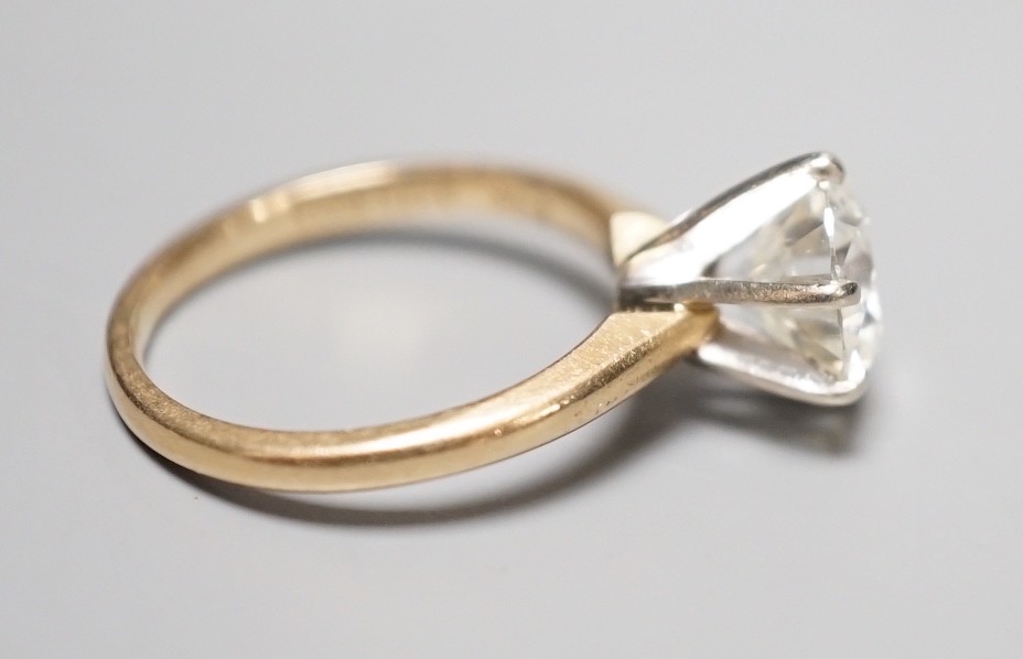 A 14k yellow metal and solitaire diamond ring, the stone weighing 2.04ct, size J/K, gross weight 3.1 grams